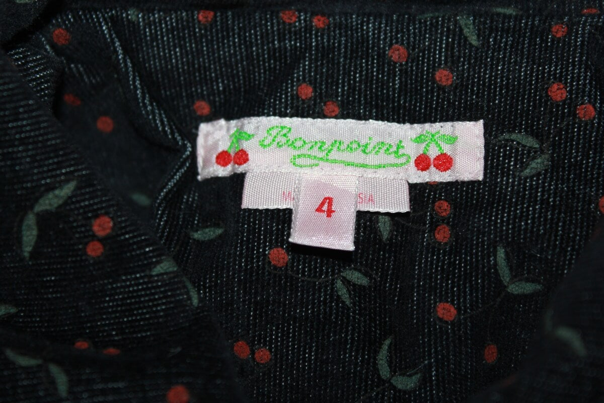 tweedehands zwarte ribfluwelen jas met rode kersjes van bonpoint maat 98-104