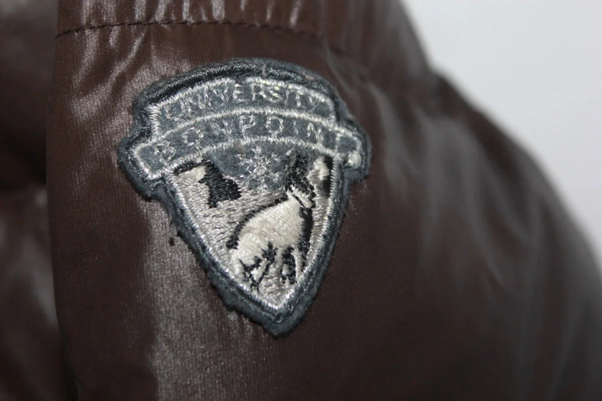 Tweedehands unisex bruin warm winterjack met bontrand aan de capuchon van bonpoint in maat 86