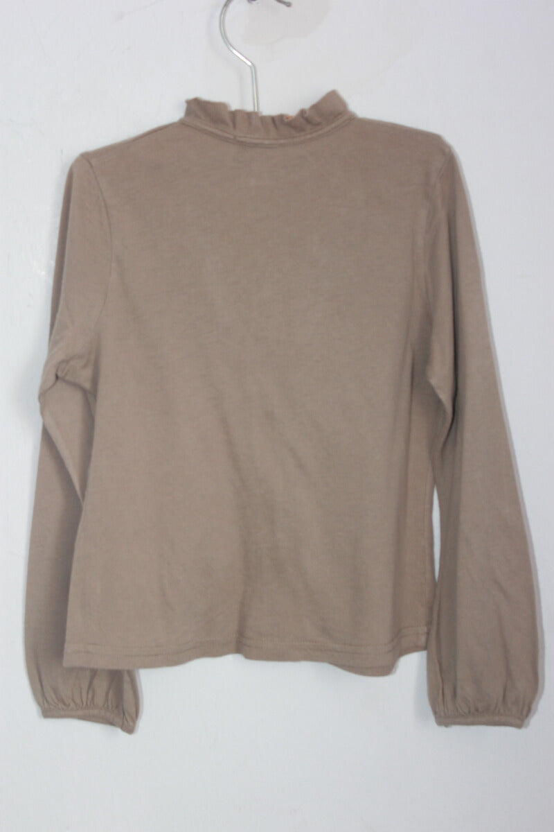 tweedehands beige vest met volants aan de voorkant in maat 116 voor een meisje van essentiel antwerp