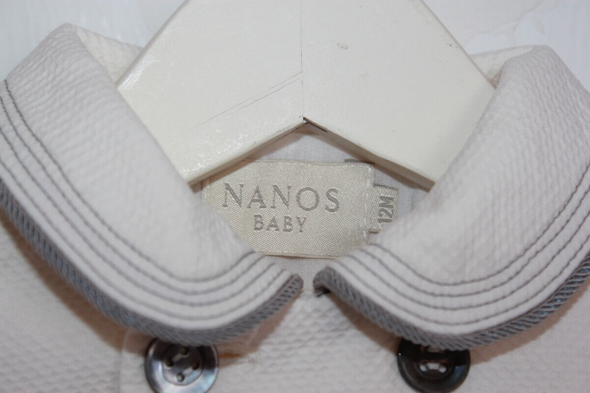 tweedehands unisex katoenen zomerse ecru jas met grijze details van Nanos in maat 68
