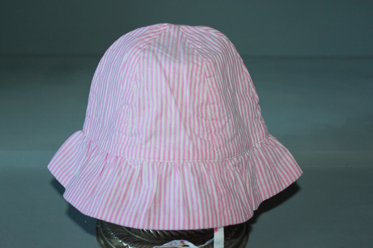 tweedehands katoenen roze met wit gestreept zonnehoedje van jacadi in maat 68 voor een baby meisje