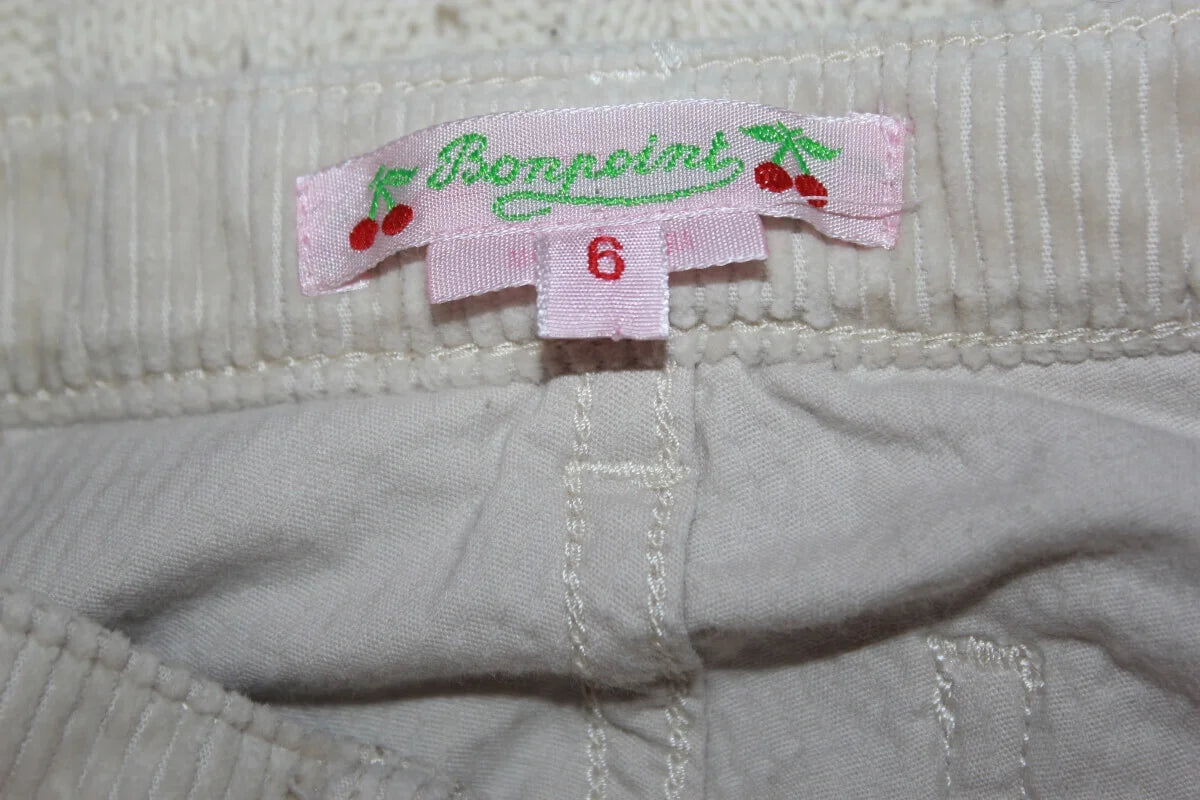 tweedehands ribfluwelen beige lange broek van bonpoint, maat 110-116 voor een meisje. flared model