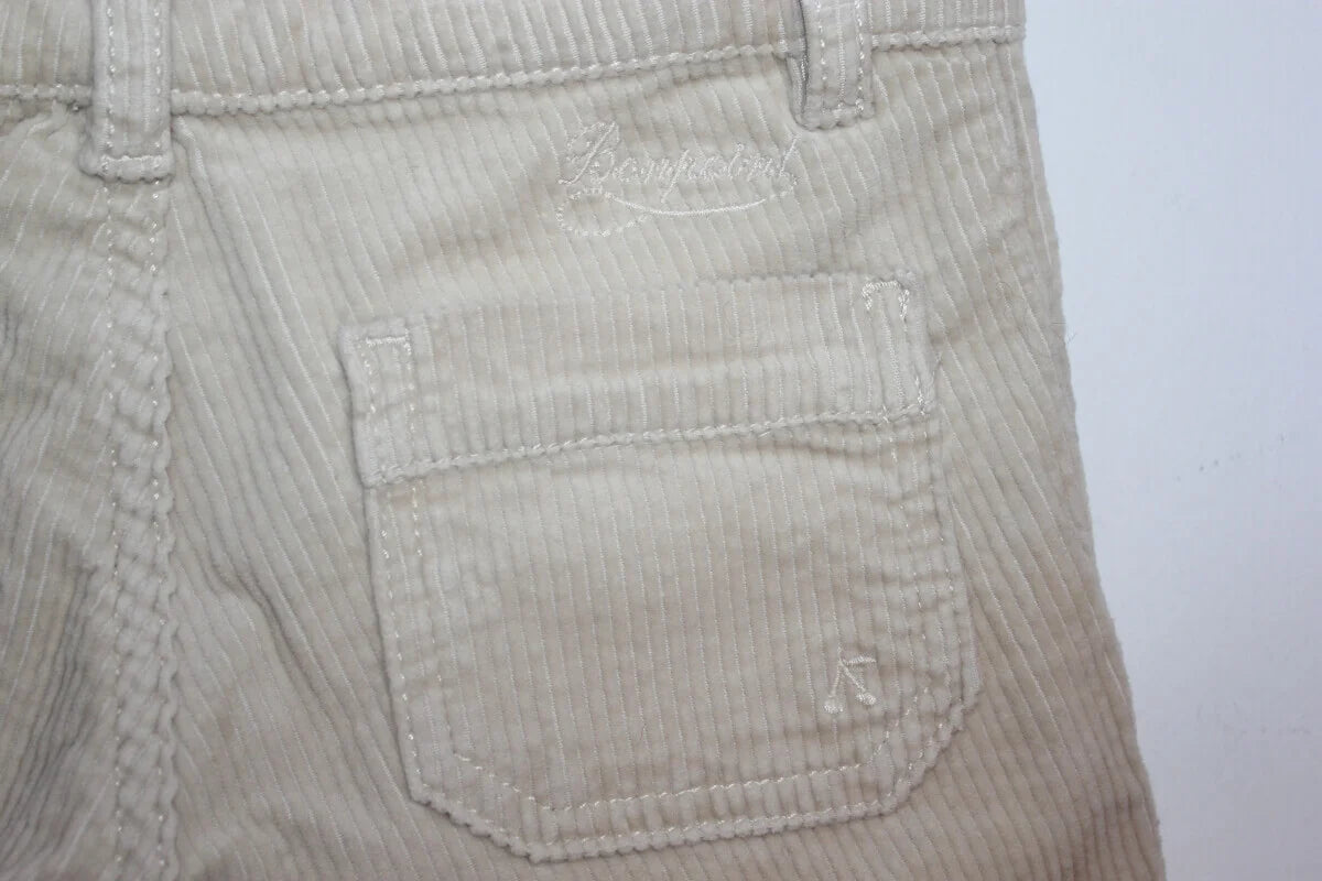 tweedehands ribfluwelen beige lange broek van bonpoint, maat 110-116 voor een meisje. flared model