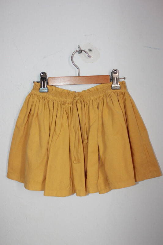 tweedehands ribfluwelen mosterdgele rok van bonton in maat 110-116