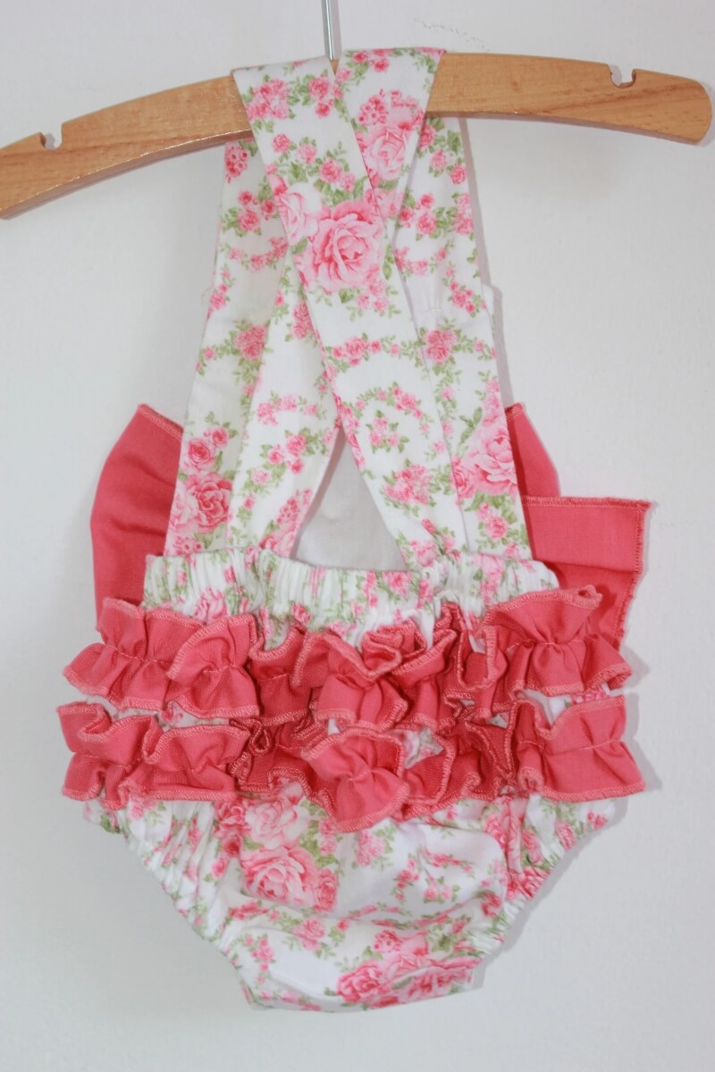 tweedehands-zomers-gebloemd-kort-mouwloos-pakje-strik-lole-maat-56-baby-meisje