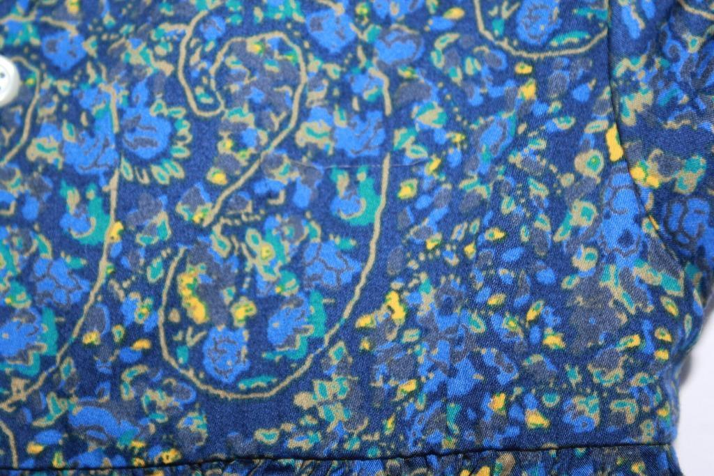 tweedehands-blauwe-gesmockte-gebloemde-jurk-korte-mouwen-volantkraag-gocco-maat-92-meisje