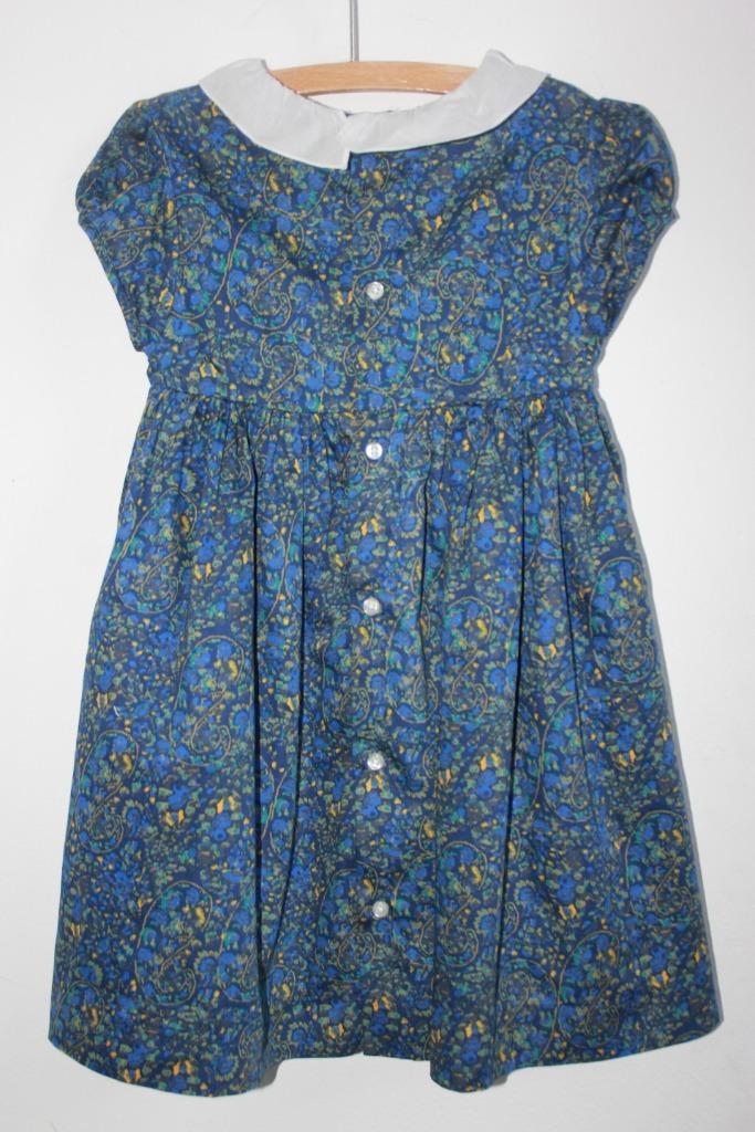 tweedehands-blauwe-gesmockte-gebloemde-jurk-korte-mouwen-volantkraag-gocco-maat-92-meisje