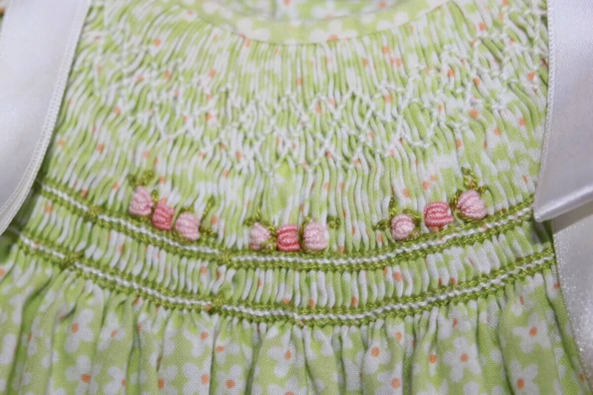 tweedehands-zomerse-gesmockte-jurk-korte-volantmouwen-flowerprint-el-corte-ingles-maat-62-baby-meisje