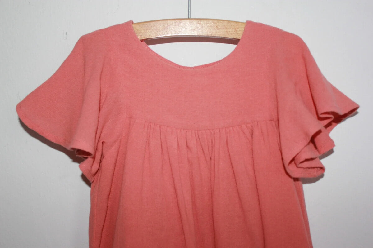 tweedehands-koraalroze-zomerse-jurk-korte-mouwen-maat-98-monoprix