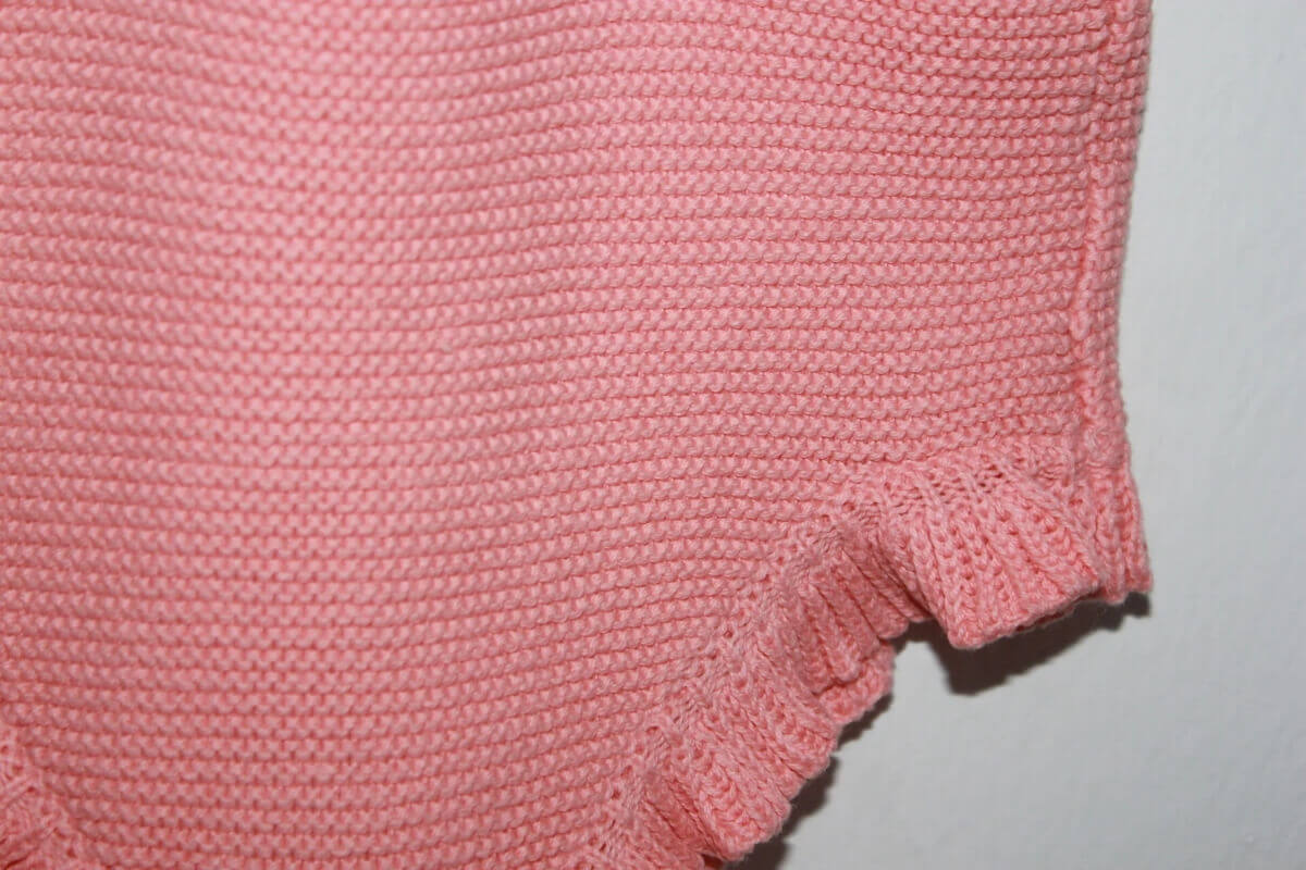 tweedehands-koraalroze-gebreid-kort-pakje-unit-baby-meisje-maat-62