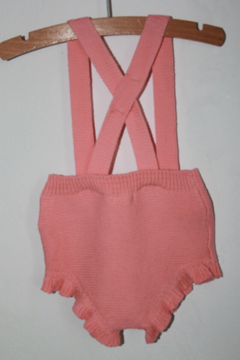 tweedehands-koraalroze-gebreid-kort-pakje-unit-baby-meisje-maat-62
