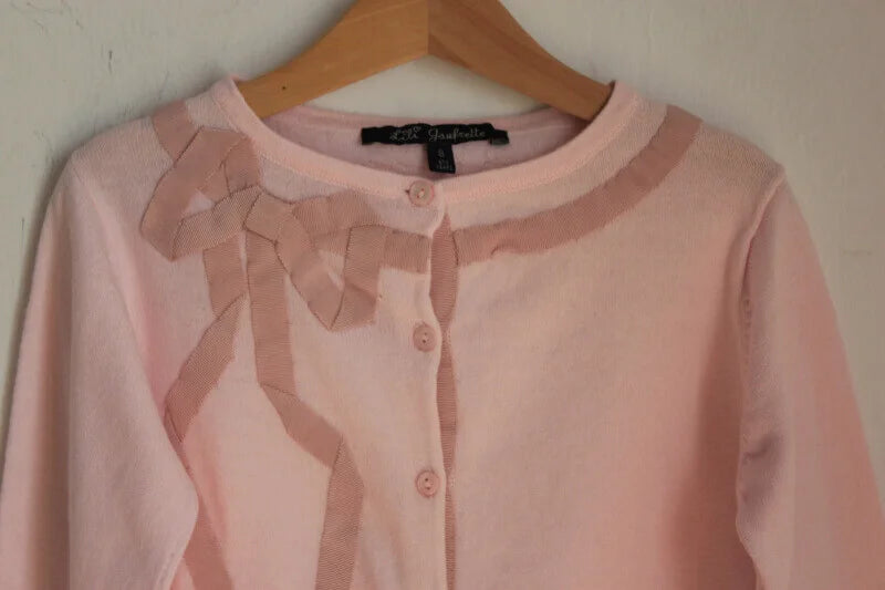 tweedehands-lichtroze-vest-maat-128-meisje-lili-gaufrette