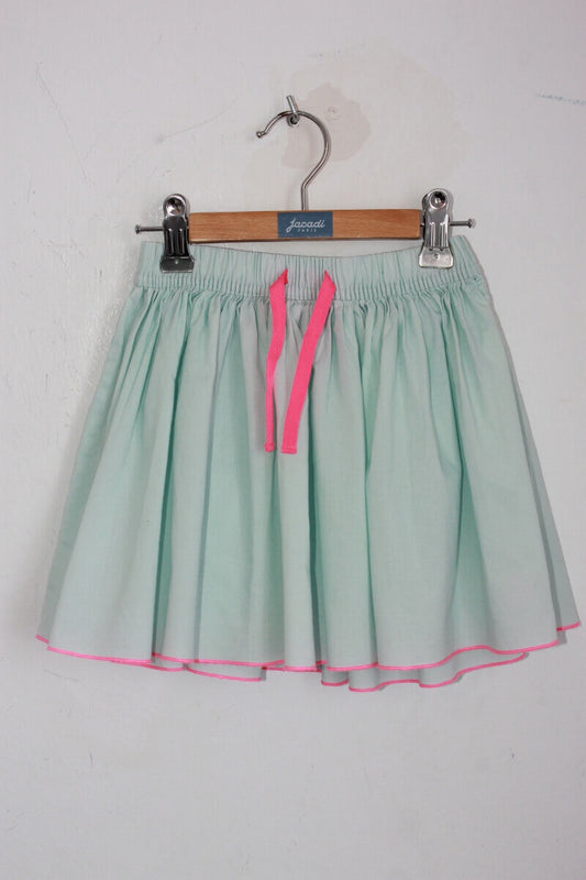 tweedehands katoenen lichtgroene zomerse rok met felroze details in maat 110 van petit bateau